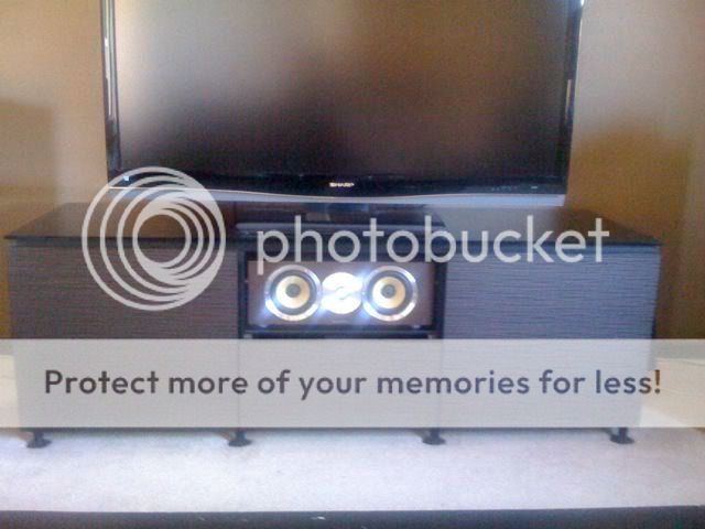 rear ported center speaker in cabinet